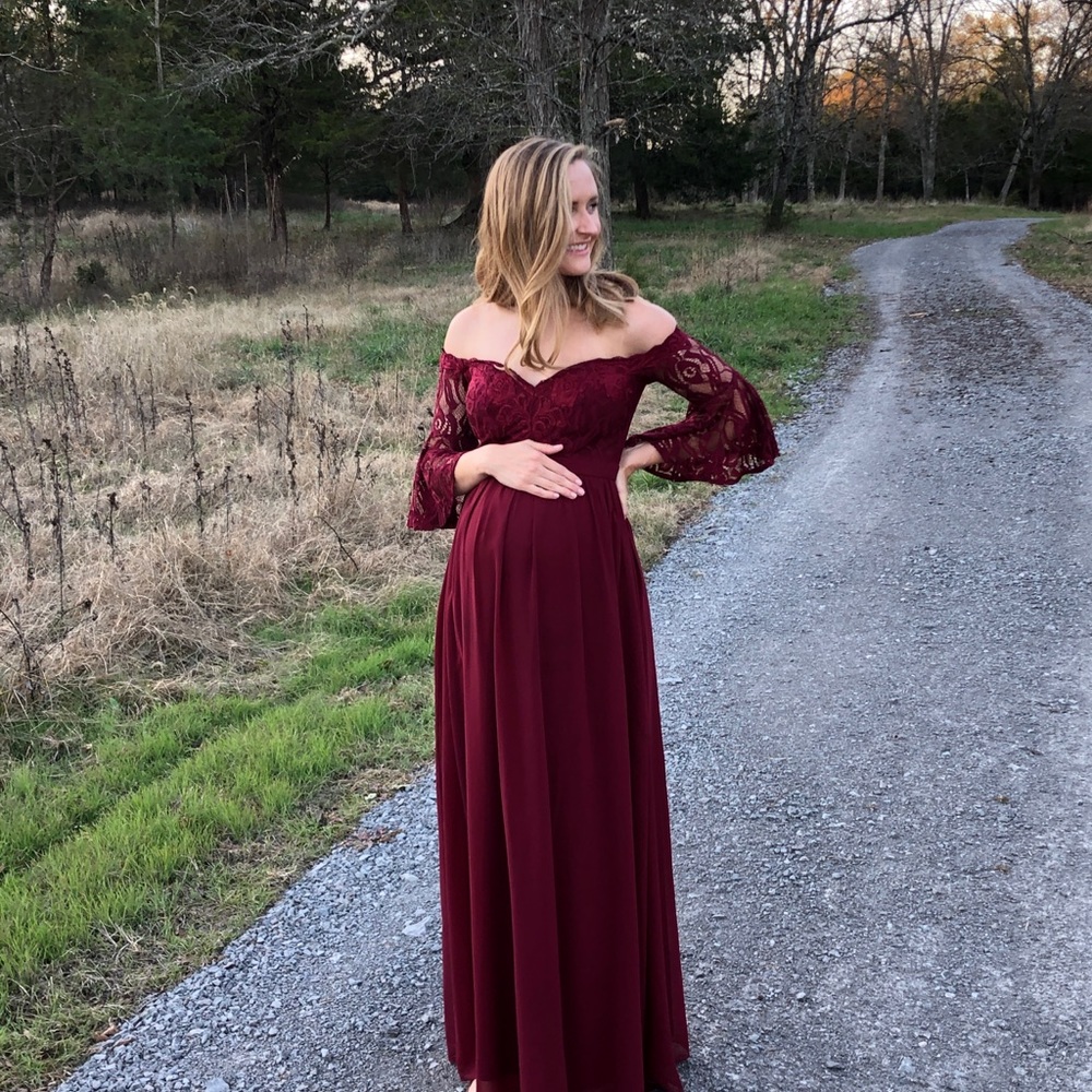 Burgundy lace off shoulder gown.